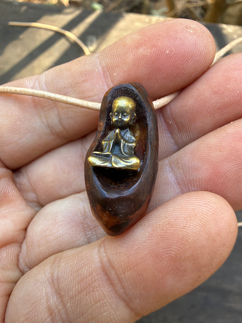Buddha in Baumperle