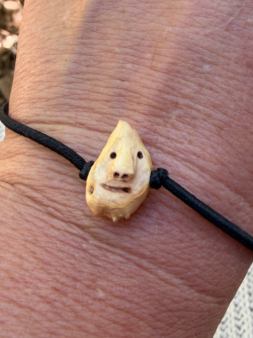 Armbandwichtel Flipsel handgeschnitzt aus magischer Baumperle