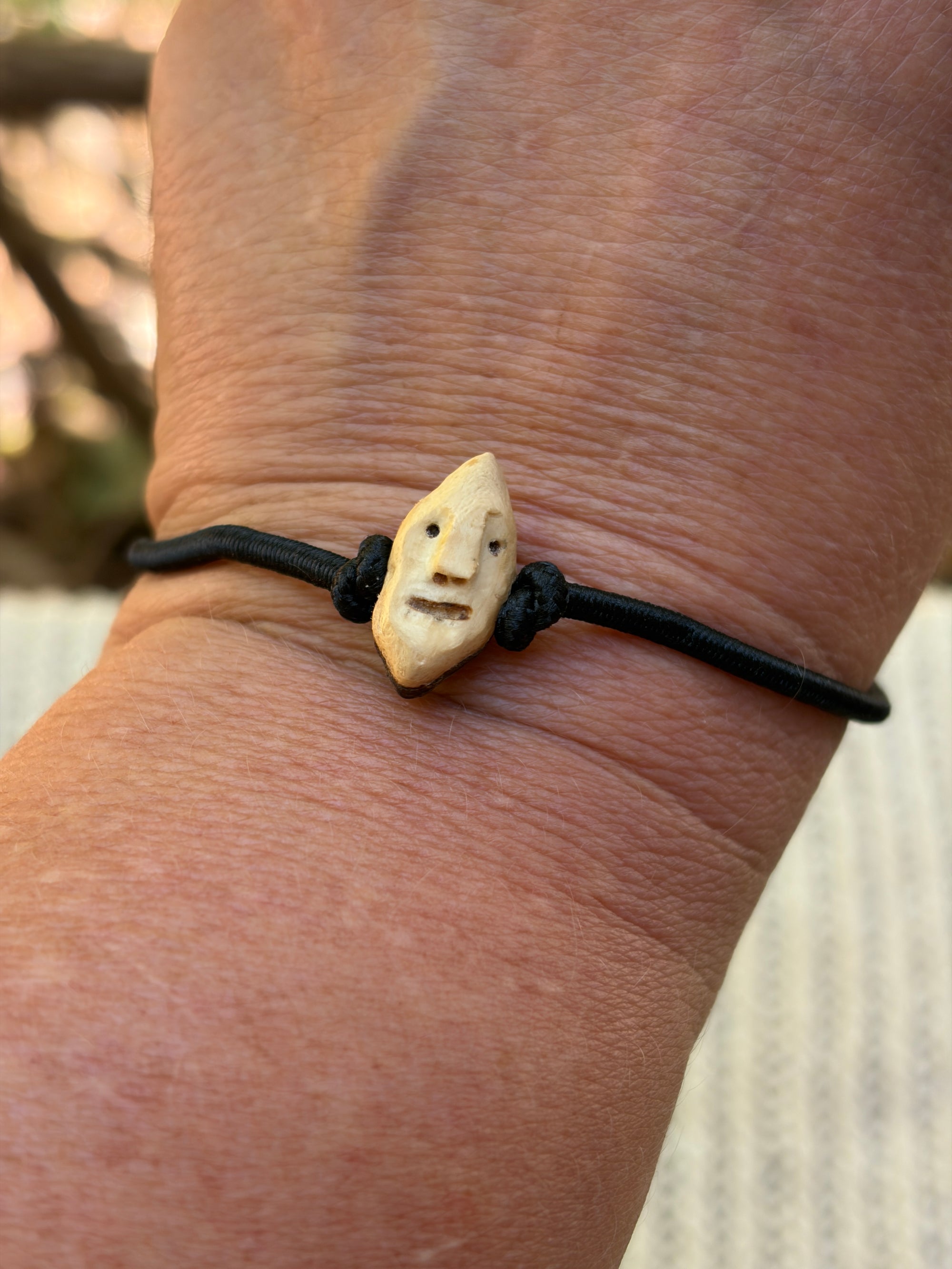 Armbandwichtel Wippel handgeschnitzt aus magischer Baumperle