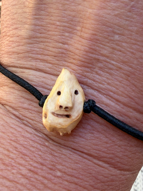 Armbandwichtel Flipsel handgeschnitzt aus magischer Baumperle