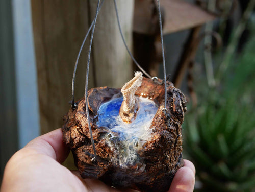 Baumperle mit Wasserfall und Segelboot