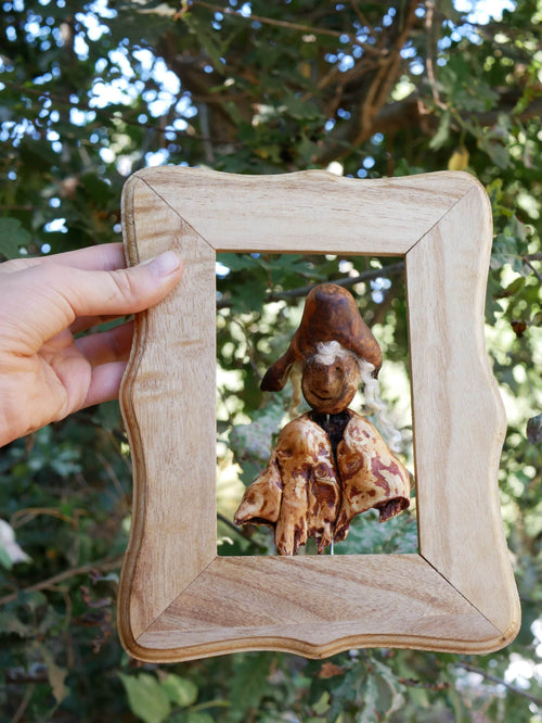 Bilderrahmen mit Skulptur