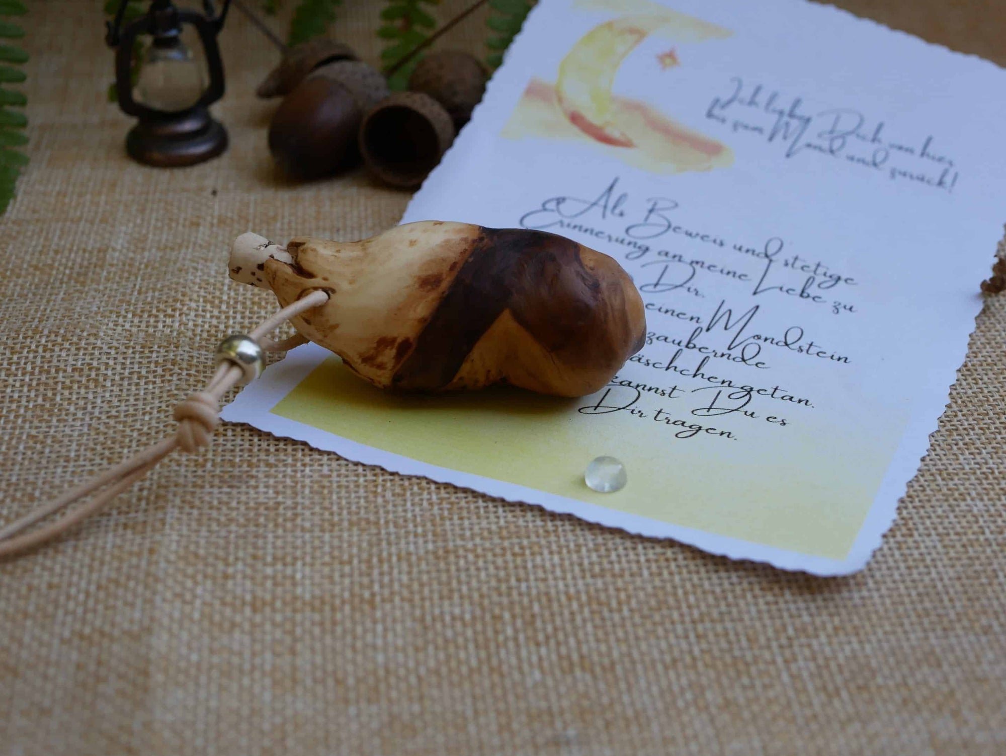 Baumperlenfläschchen mit einem Mondstein