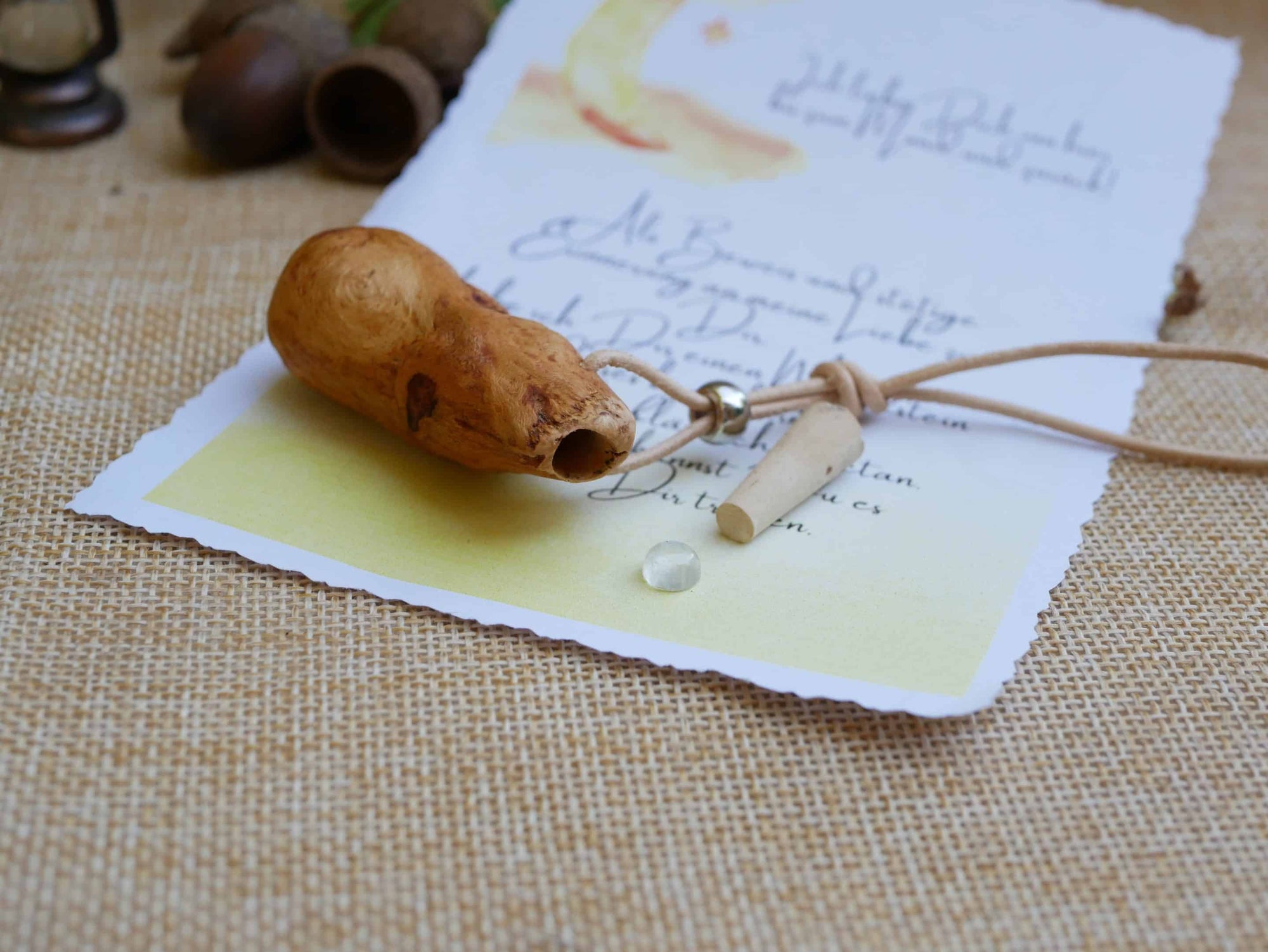 Baumperlenfläschchen mit einem Mondstein