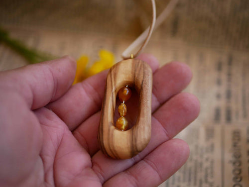 Olivenholz Kette mit Bernstein