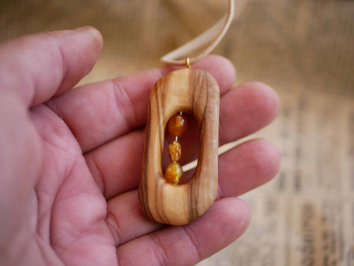 Olivenholz Kette mit Bernstein