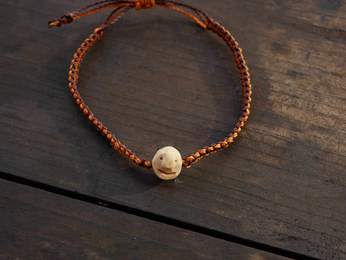 Armband Wichtel aus Baumperle und Makramee