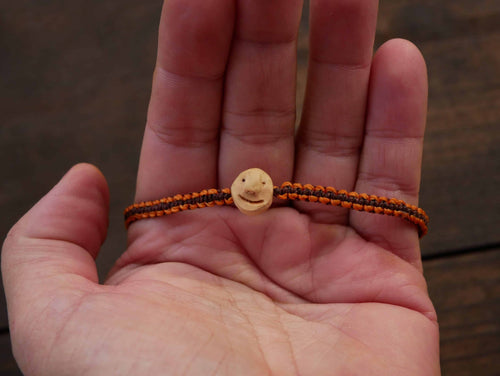 Armband Wichtel aus Baumperle und Makramee