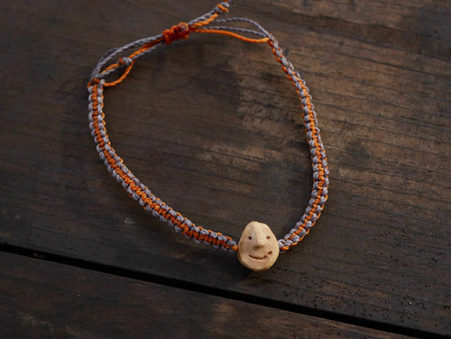 Armband Wichtel aus Baumperle und Makramee