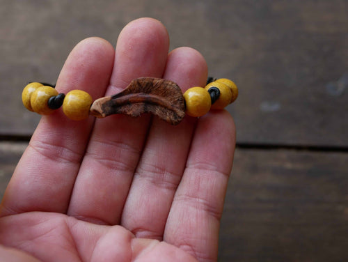 Armband Feder Baumperle