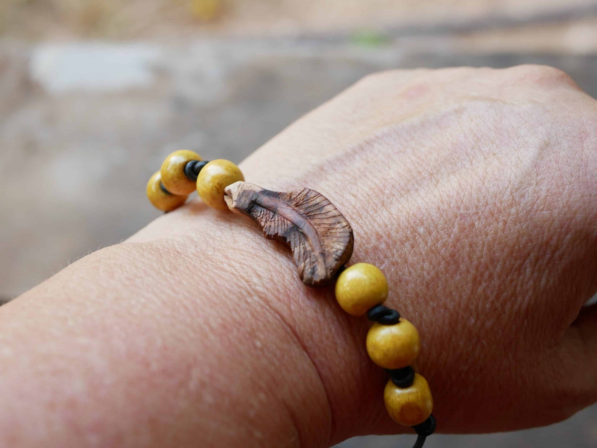Armband Feder Baumperle