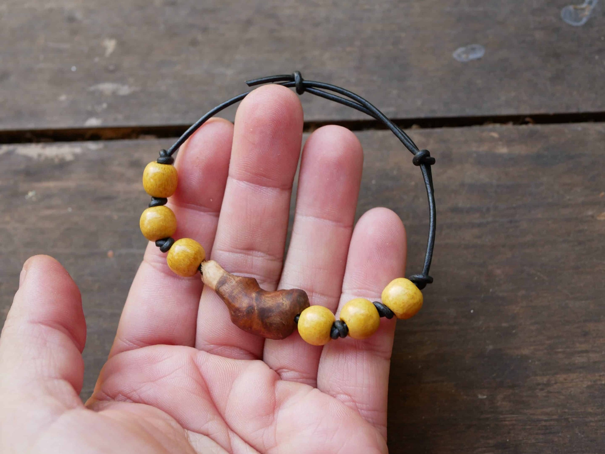 Armband Feder Baumperle