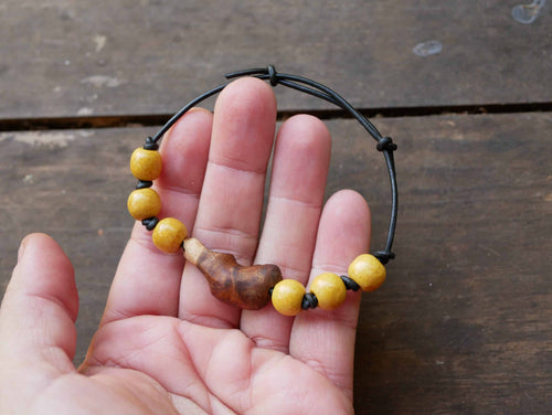 Armband Feder Baumperle