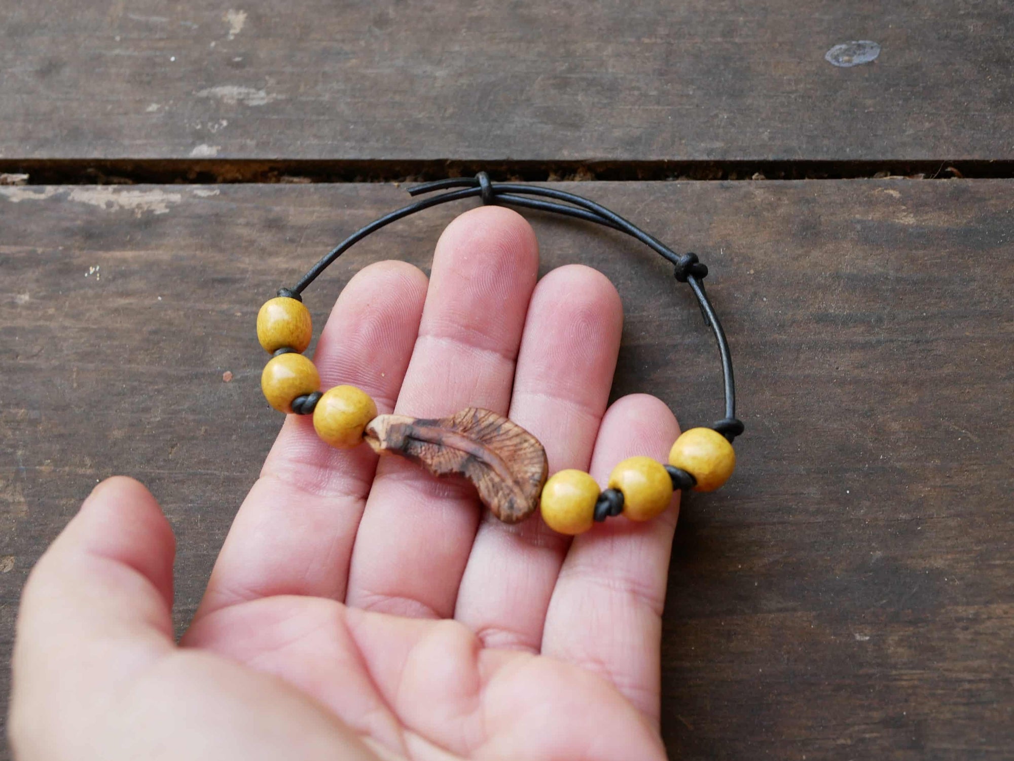 Armband Feder Baumperle