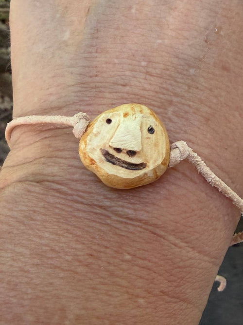 Armbandwichtel Kienzel handgeschnitzt aus magischer Baumperle