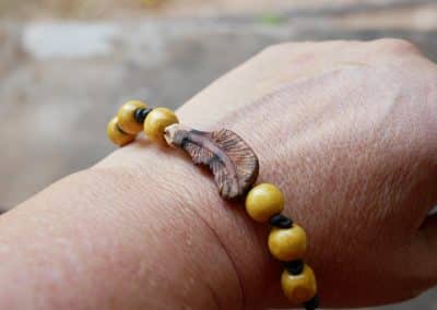 Armband Feder Baumperle