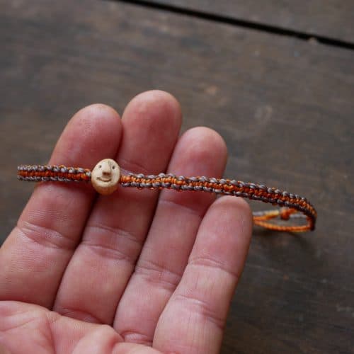 Baumperlen Wichtel Armband Makramee