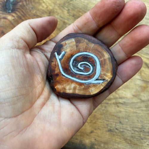 Handschmeichler mit Schnecke aus Metall